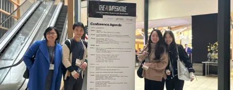 AI Conference at Indianapolis - Graduate student leader discussing AI with engineers and educators